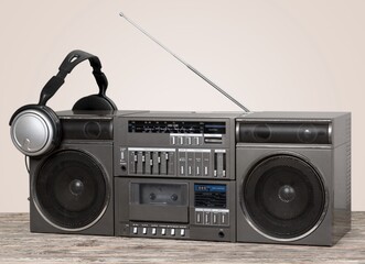 Wall Mural - Retro radio or old cassette recorder on desk