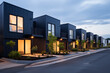 Modern apartment buildings on the street in the evening. 3d rendering