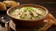 © Justlight - A bowl of warm and comforting chicken noodle soup takes center stage in this cozy shot. The soup is generously garnished with finely sliced shallots, which lend a gentle pungency to the