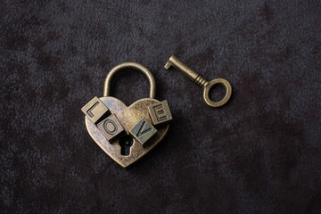 Wall Mural - Love shaped padlock, key and love wording