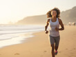 African American woman jogging on beach, health care fitness and outdoors activity concept