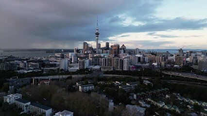 Wall Mural - Auckland, New Zealand: Aerial drone footage of Auckland downtown district skyline view from Ponsonby residential district in New Zealand largest city. 