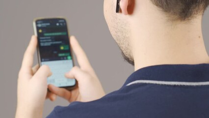 man texting on the phone.