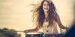 Dynamic woman, joyfully playing drums at a vibrant outdoor festival exuding freedom and rhythm.