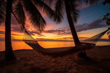 Canvas Print - evening beach scene with a hammock between two palm trees