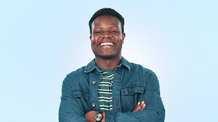 Canvas Print - African man, laughing and arms crossed in studio by blue background, happiness and smile portrait. Black guy, fashion and funny with confident in body language, comedy and laughter in mockup