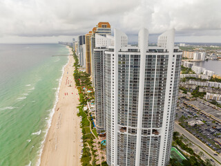Wall Mural - Aerial drone photo towers on Sunny Isles Beach Florida north of Miami Beach. Scenic beach and ocean sea scene