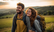 Couple hiker traveling, walking Italian Tuscan Landscape view under sunset light. Man and Woman traveler enjoys with backpack hiking in mountains. Travel, adventure, relax, recharge concept.	