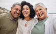 © Talia Mdlungu/peopleimages.com - Portrait, funny woman and senior parents at beach on holiday, vacation or travel outdoor. Face, daughter and elderly mother and father bonding together at ocean for family connection, smile and laugh