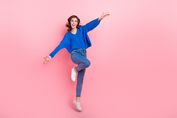 Sticker - Full body portrait of overjoyed energetic lady jumping have good mood empty space isolated on pink color background