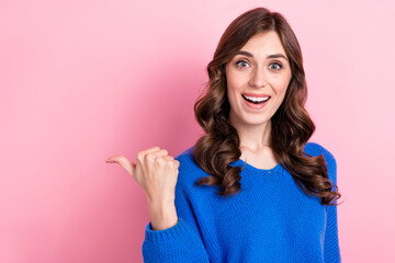 Sticker - Photo of cheerful positive lady wear blue stylish clothes finger direct empty space cool proposition isolated on pink color background