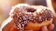 a close-up of a person eating doughnut,biting into a doughnut.generative ai