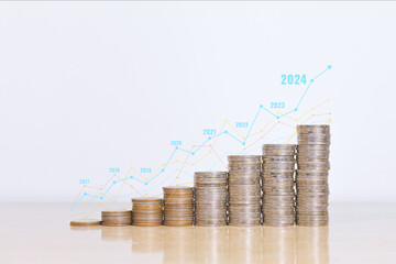 Wall Mural - Coins stacks with up arrow graph corporate for planning businesses. Goals to success for corporate future in 2024. Concept for invest, finance and business strategy