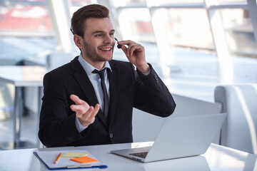 Wall Mural - Attractive businessman working