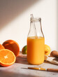 Vibrant Citrus Delight Fresh Orange Juice in Glass Bottle with straw
