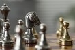Silver knight and other chess pieces on game board, closeup
