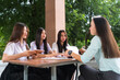 © EduLife Photos - Asian university students meet their education advisor to discuss their academic project outdoor in campus