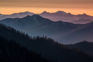 Wall Mural - Layer of mountain at sunset time generative AI