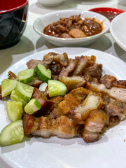 Roast pork. Traditional Batak dish roast pork belly. Served with cucumber