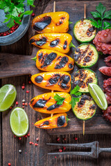 Wall Mural - Hot grilled skewer with peppers, tomatoes and zucchini.