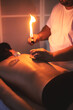 © Alex Vog - Doctor therapist does wellness hot cupping massage therapy rehabilitation for athletic man in medical clinic office. Vacuum cups on back, close up. Rehab relaxing massage concept. Copy ad text space