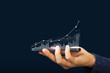 © sichon - Hand holding smartphone or mobile phone with growth business graph and. Business economic and technology concept
