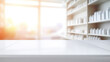 An empty white table on a blurry pharmacy background