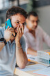 © qunica.com - A focused and modern office team engaged in digital marketing, analyzing statistics, and solving problems together. Dedicated to teamwork and success.