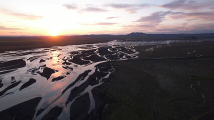 Wall Mural - Markarfljót is a river in the south of Iceland. The main sources for the river are the glaciers Mýrdalsjokull and Eyjafjallajokull. Midnight sun at the Markarfjot estuary.