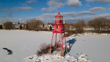 Alpena, Michigan Historic Lighthouse Along Lake Huron In The Winter.