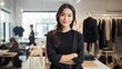 © Oulaphone - Asian attractive women fashion designer is smiling while standing in office.