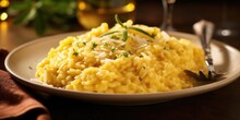 A Hearty Plate Of Italian Risotto Showcases Creamy Arborio Rice Cooked To Perfection, Infused With Flavors Of Saffron, Parmesan Cheese, And A Touch Of White Wine, Then Garnished With A Sprinkle