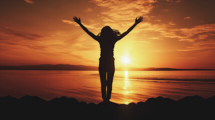 Wall Mural - silhouette woman open arms sunset