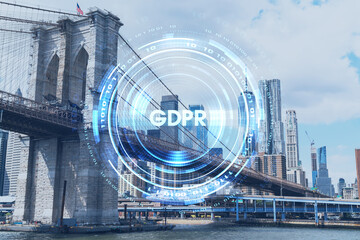 Brooklyn bridge with New York City Manhattan, financial downtown skyline panorama at day time over East River. GDPR hologram, concept of data protection, regulation and privacy for all individuals