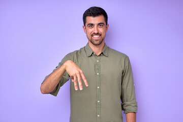 cheerful brunette bearded man demonstrating the letter m m . sign language symbol for deaf human in 