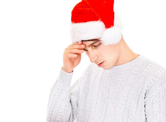 Canvas Print - Young Man in Santa Hat is Thinking