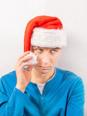 Poster - Sad Young Man in Santa Hat