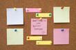 © methaphum - collection of colorful variety post it. paper note reminder sticky notes pin paper blue  on cork bulletin board. empty space for text.