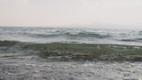 Fototapeta Morze - closeup shot of clear water waves of a lake