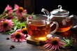 echinacea tea brewing in a clear teapot, fresh echinacea flowers nearby