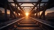 railroad tracks on a bridge at sunset