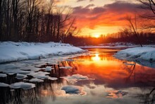 Winter Solstice Sunset Reflecting On Icy River