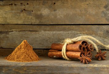 Poster - organic spices cinnamon sticks and ground