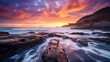 Long exposure of a rocky beach at sunset with long exposure effect.