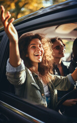 Wall Mural - A group of girls friends travel together by car, laugh and have fun on vacation