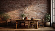 A rustic dining room with an exposed brick wall, a wooden table, and metal chairs