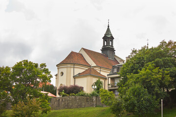 Wall Mural - Old Catholic church on top of a hill in Warsaw