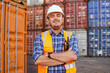 © glebcallfives - Portrait of smiling container man worker in container warehouse. Import and export shipping. Logistics management in container yard.