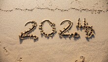 2024 Hand Written In Sand On A Beautiful Beach, New Year 2024, 2024 New Year Celebration