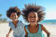 © Anna - Happy african american kids running on summer beach vacation